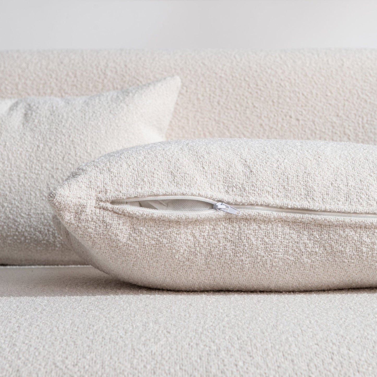 Causeuse 2 places rembourrée KINWELL Boucle avec oreillers