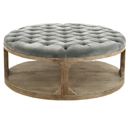 Pouf en bois capitonné en velours gris