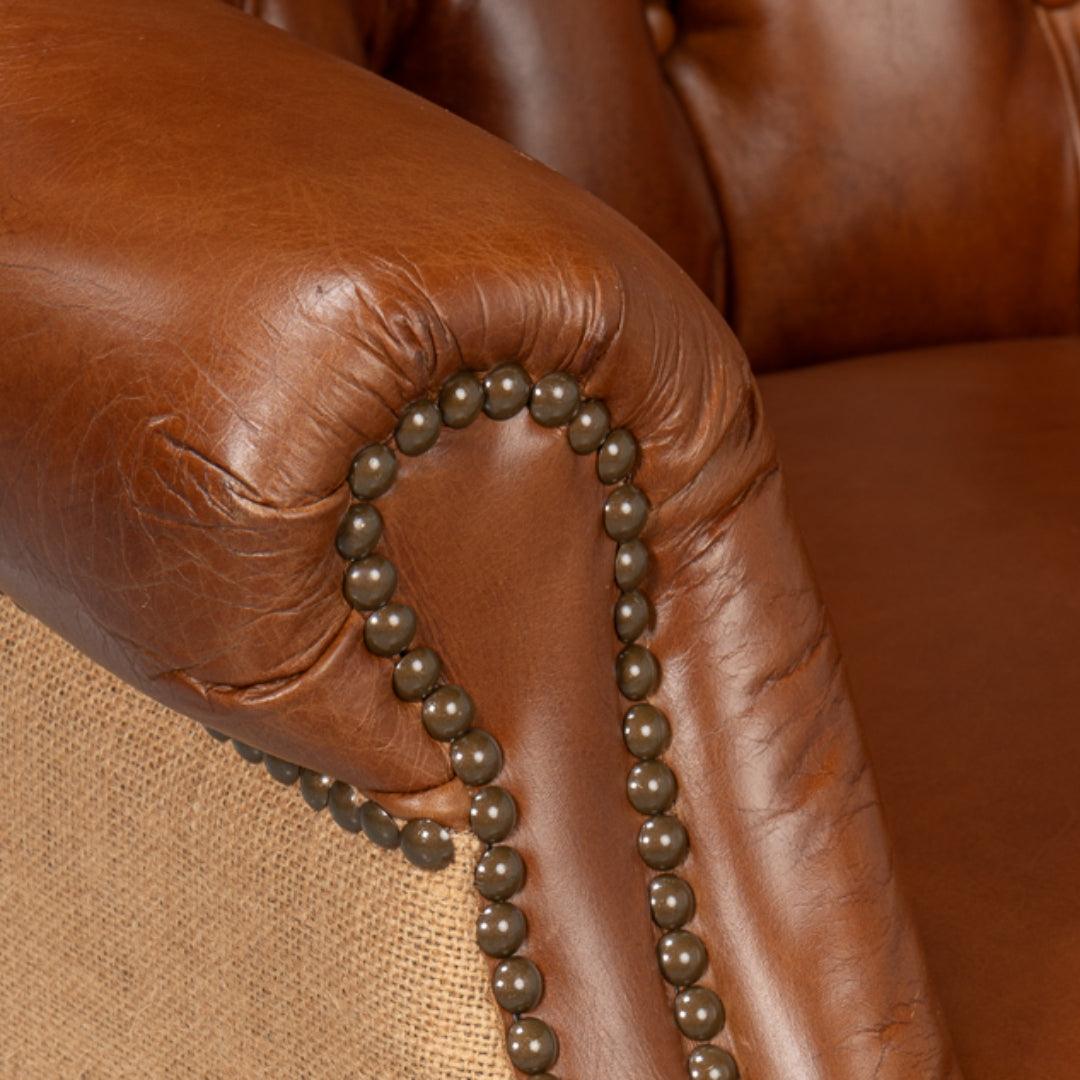 Fauteuil vintage capitonné en cuir Havana et jute
