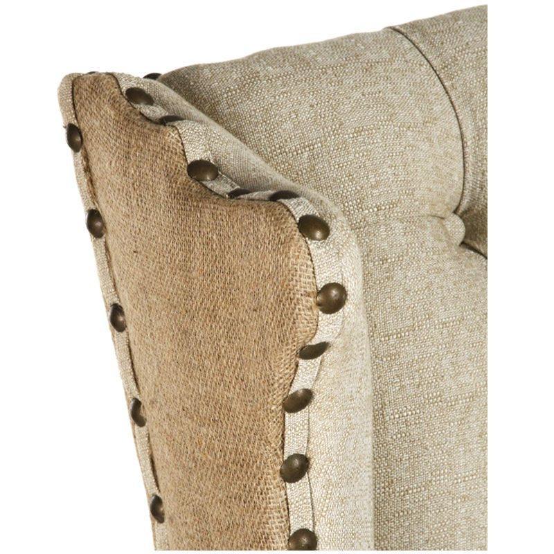 Fauteuil à oreilles capitonné en toile de jute et lin