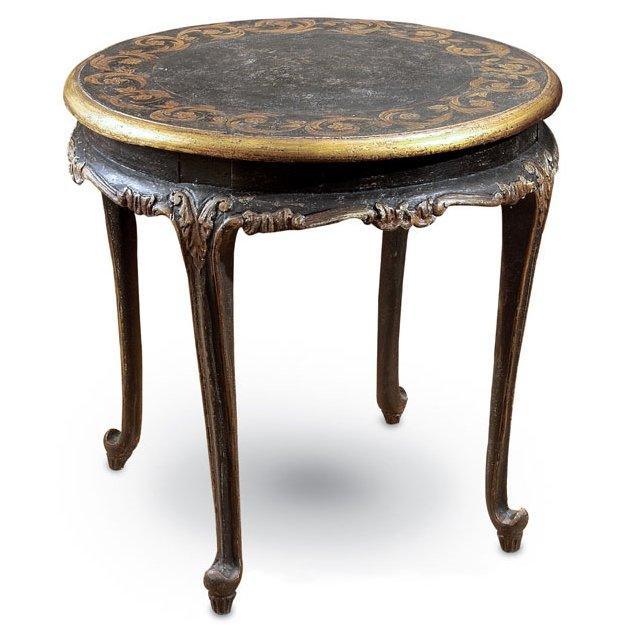 Table d'appoint noire à volutes dorées