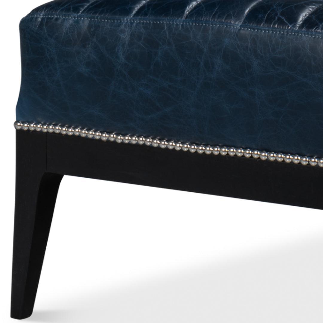 Fauteuil chausson en cuir bleu Château