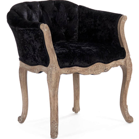 Fauteuil capitonné en velours noir