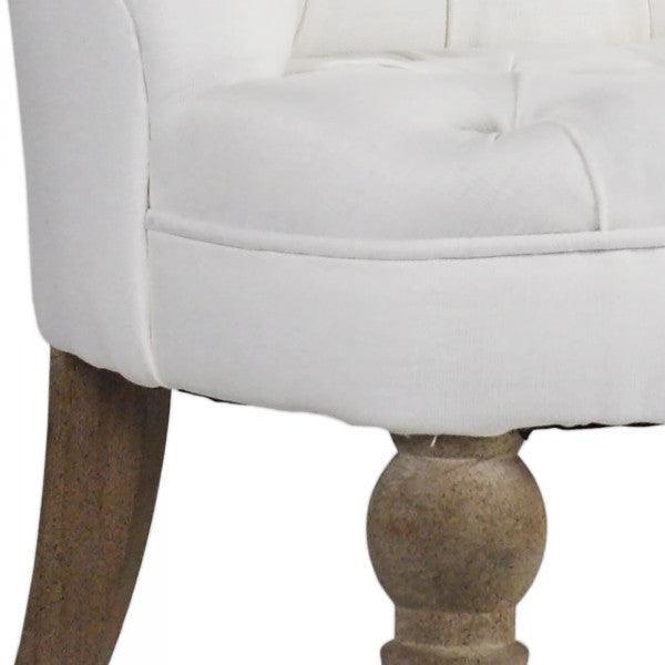 Fauteuil chausson capitonné en lin blanc