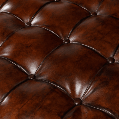 Pouf capitonné en cuir marron