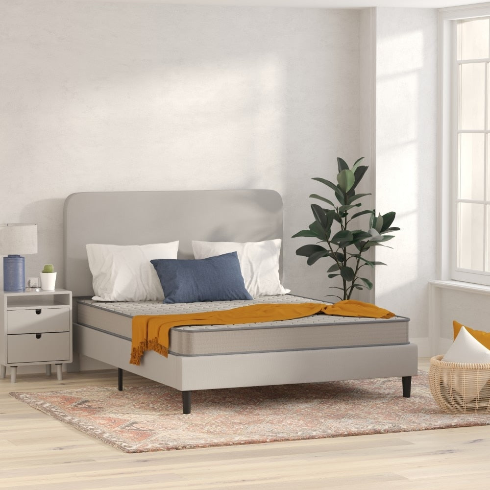 Matelas hybride à ressorts et plateau moyen