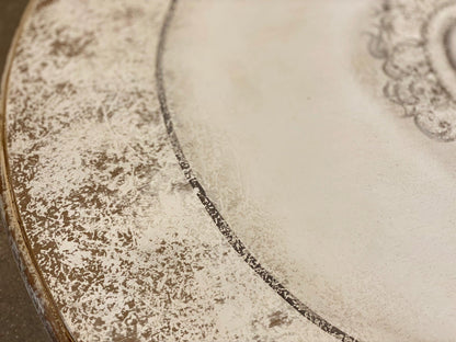 Table à manger ronde à volutes françaises