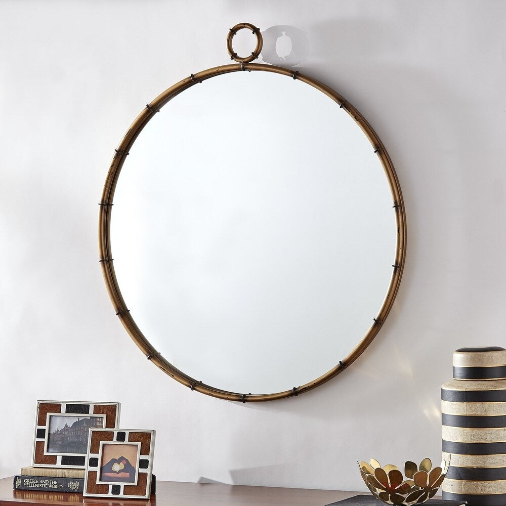 Miroir mural rond Marza finition laiton antique par iNSPIRE Q Modern