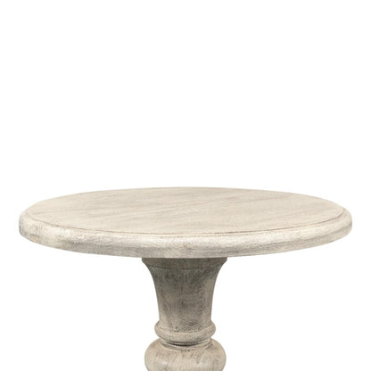 Table à piédestal statuaire et vieillie