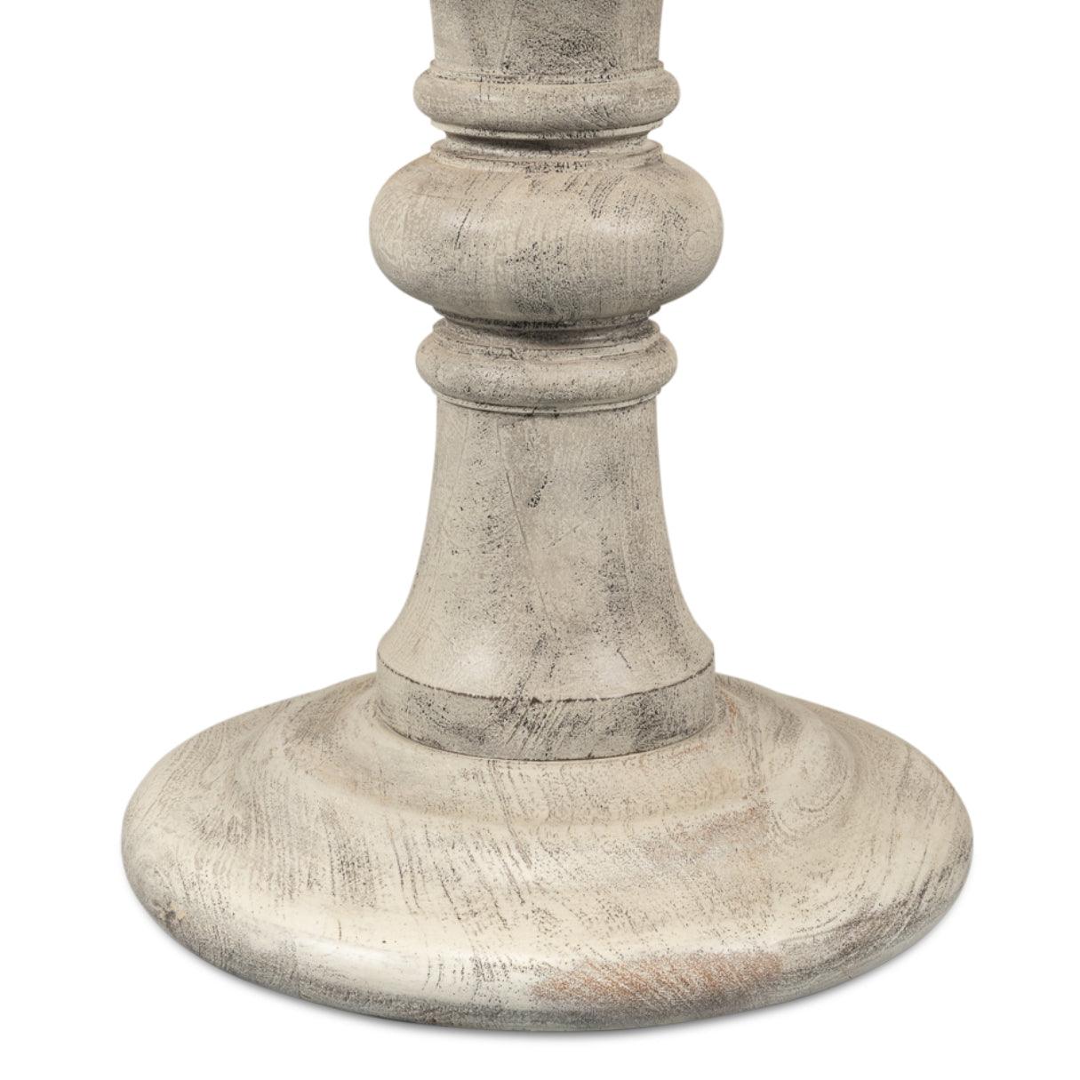 Table à piédestal statuaire et vieillie