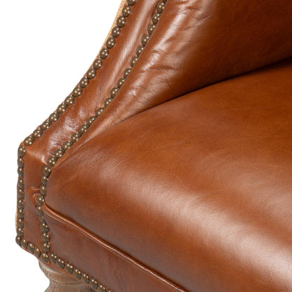 Fauteuil vintage capitonné en cuir Havana et jute