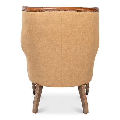 Fauteuil vintage capitonné en cuir Havana et jute