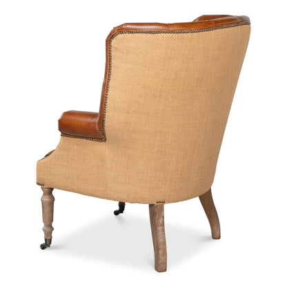 Fauteuil vintage capitonné en cuir Havana et jute