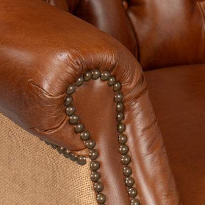 Fauteuil vintage capitonné en cuir Havana et jute