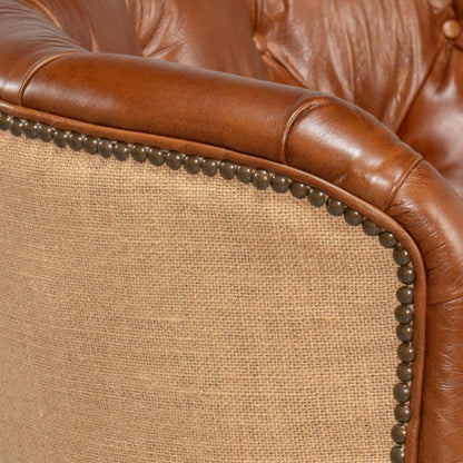 Fauteuil vintage capitonné en cuir Havana et jute