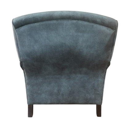 Fauteuil rétro en velours bleu pelucheux