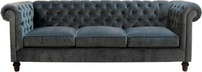 Canapé de luxe capitonné gris