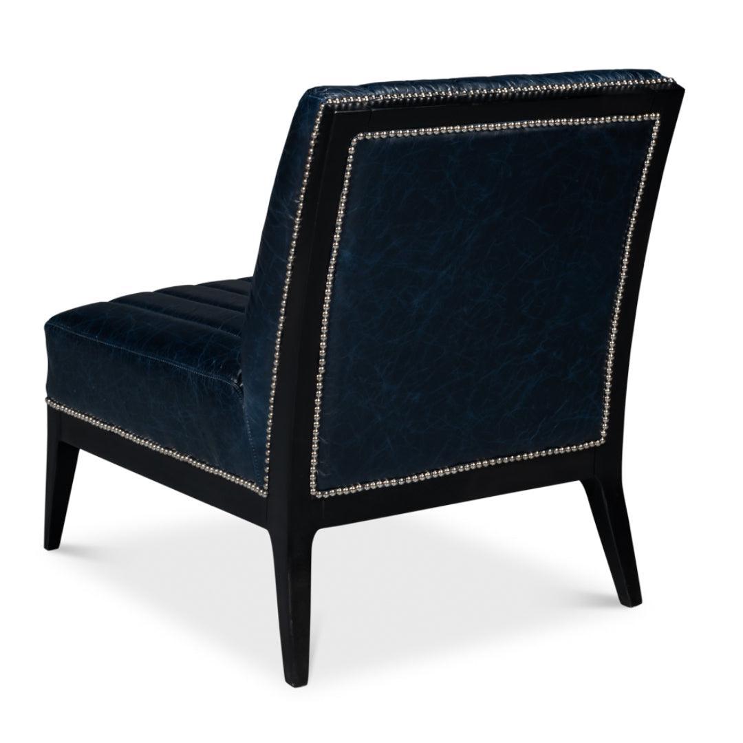 Fauteuil chausson en cuir bleu Château