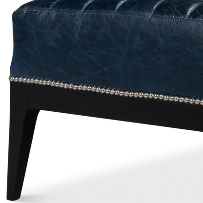 Fauteuil chausson en cuir bleu Château