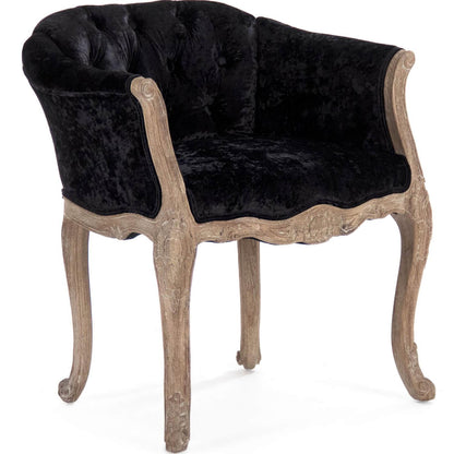 Fauteuil capitonné en velours noir