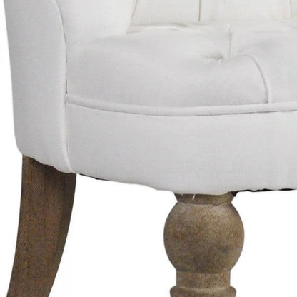 Fauteuil chausson capitonné en lin blanc
